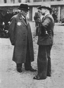 Chaim Rumkowski talking to Hans Biebow